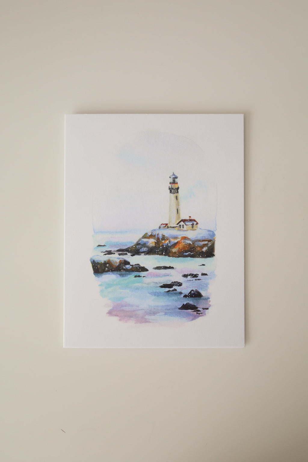 Beacon Over Icy Waves Greeting Card