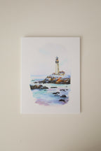Beacon Over Icy Waves Greeting Card