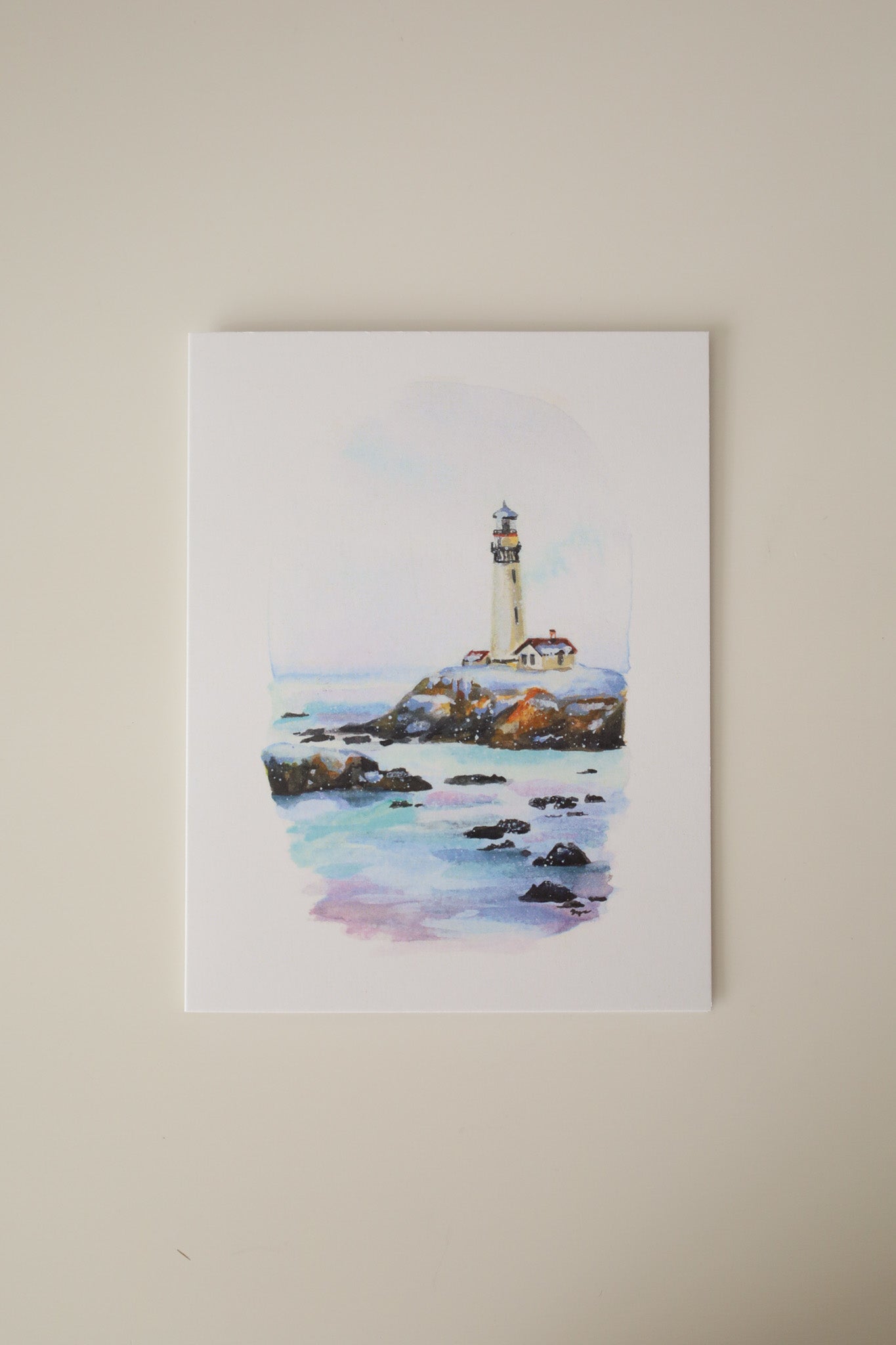 Beacon Over Icy Waves Greeting Card