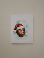 Santa Hat Football Greeting Card
